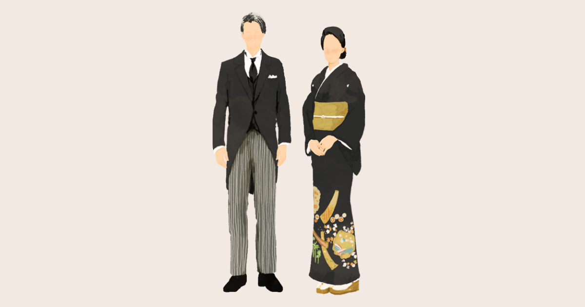 結婚式の衣装を着る両親